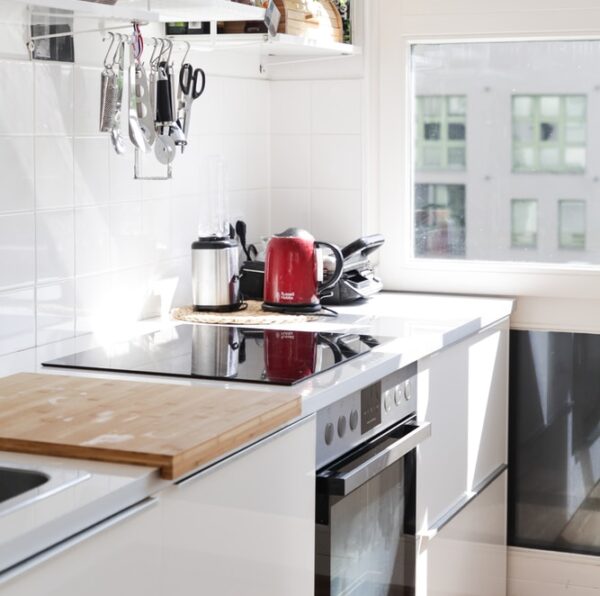 white wooden kitchen cabinet with sink