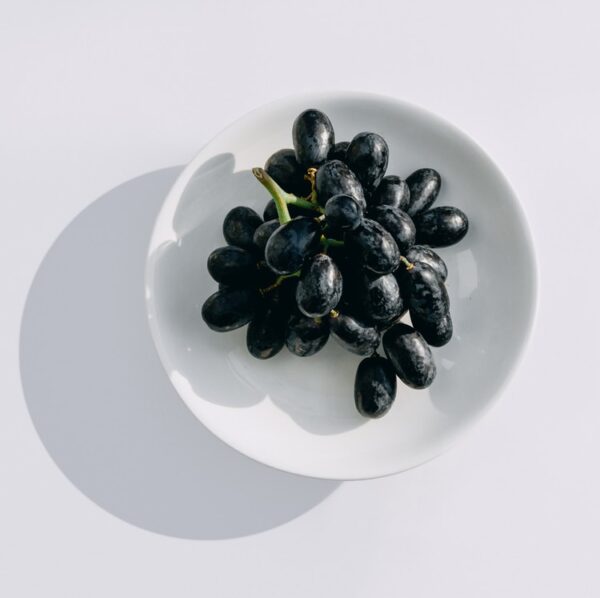 java plum on white bowl