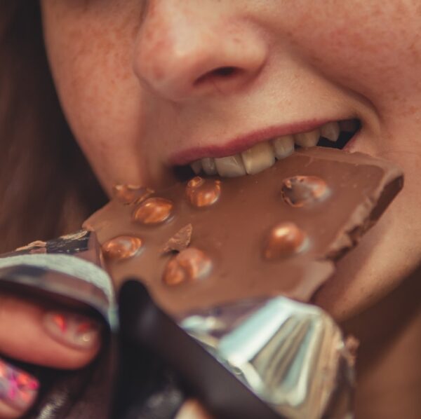 woman eating chocolate