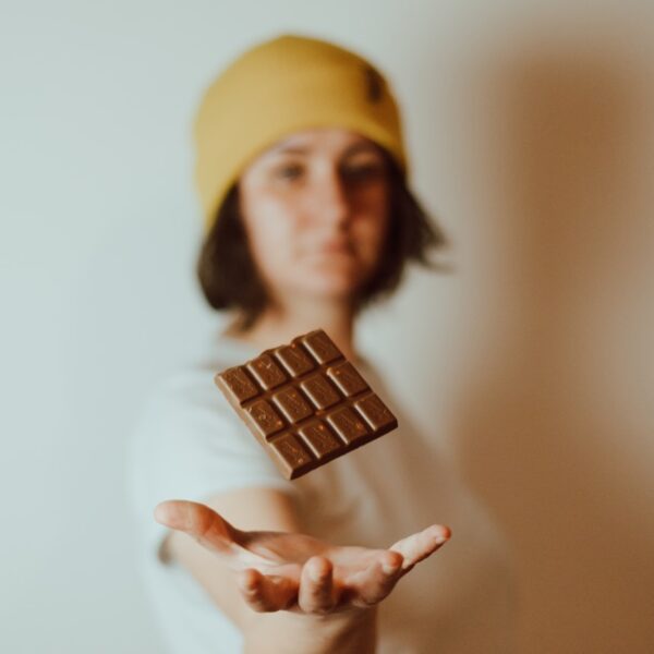 woman in yellow knit cap and white long sleeve shirt