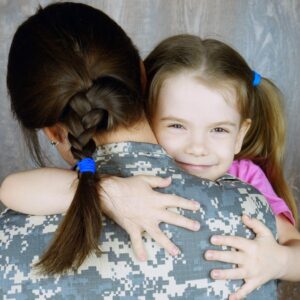 girl in black and white floral dress