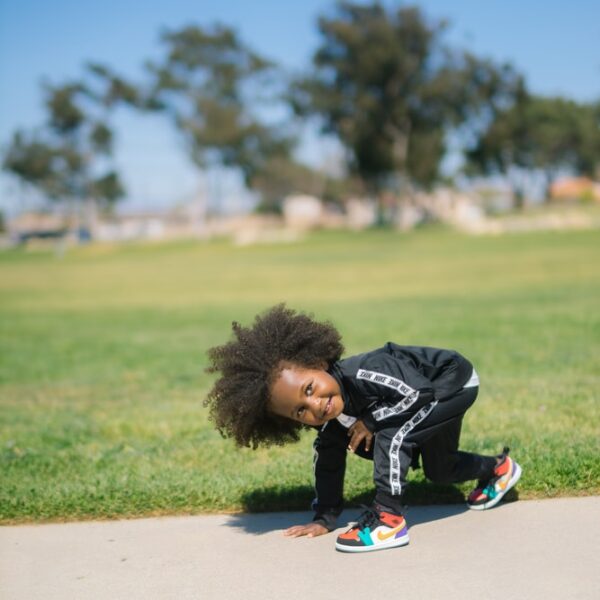 baby in black-and-white tracksuit
