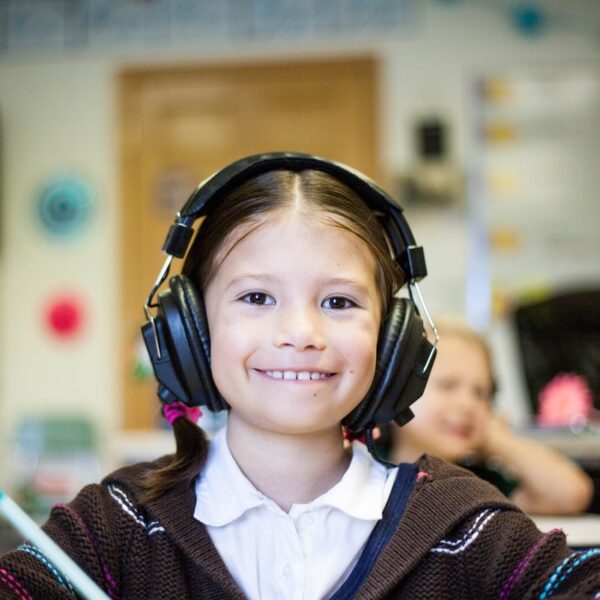 girl wearing black headphones