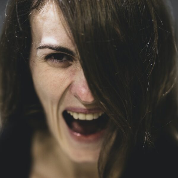 woman with black hair smiling