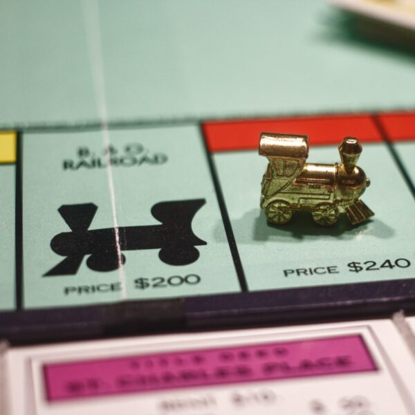 gold ring on white paper